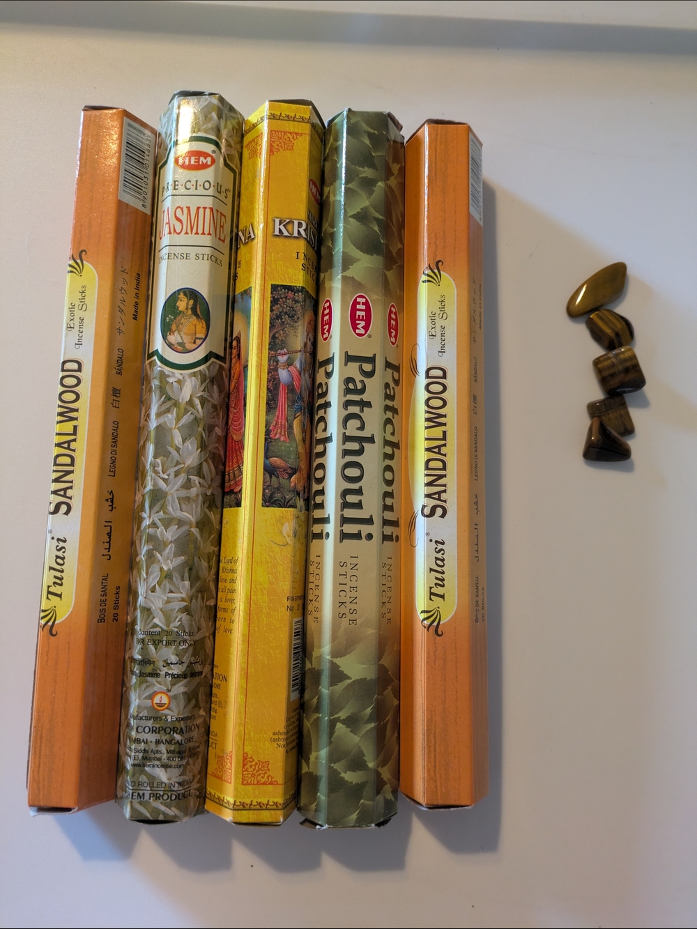 5 Hem Assorted Unopened Incense Boxes And Five Tiger Eye Tumbled Stones